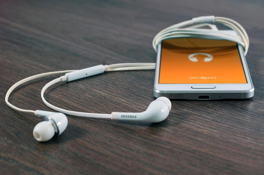 Audio waveform and icons depicting MP3 WAV FLAC file formats